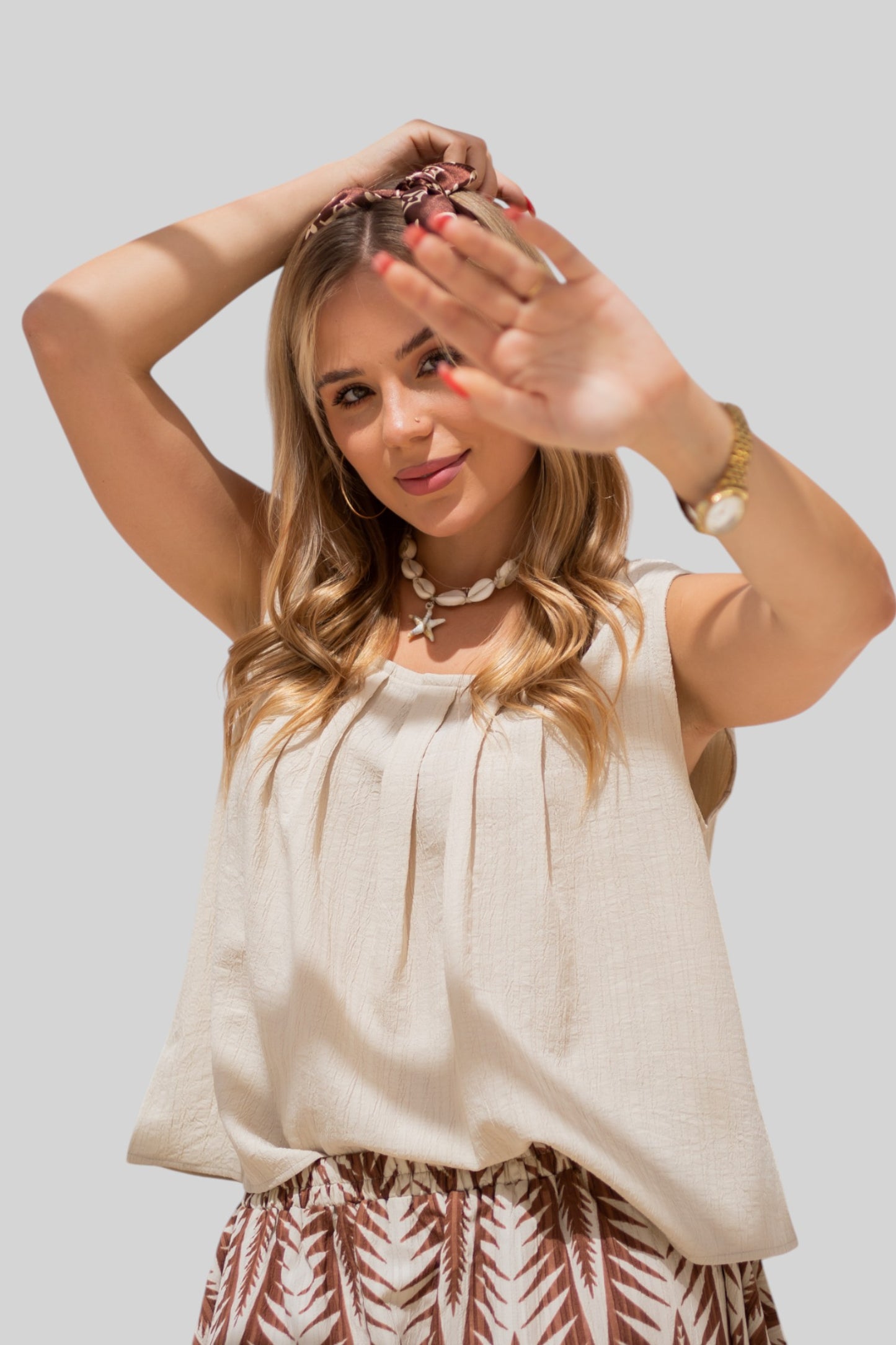Beige sleeveless top