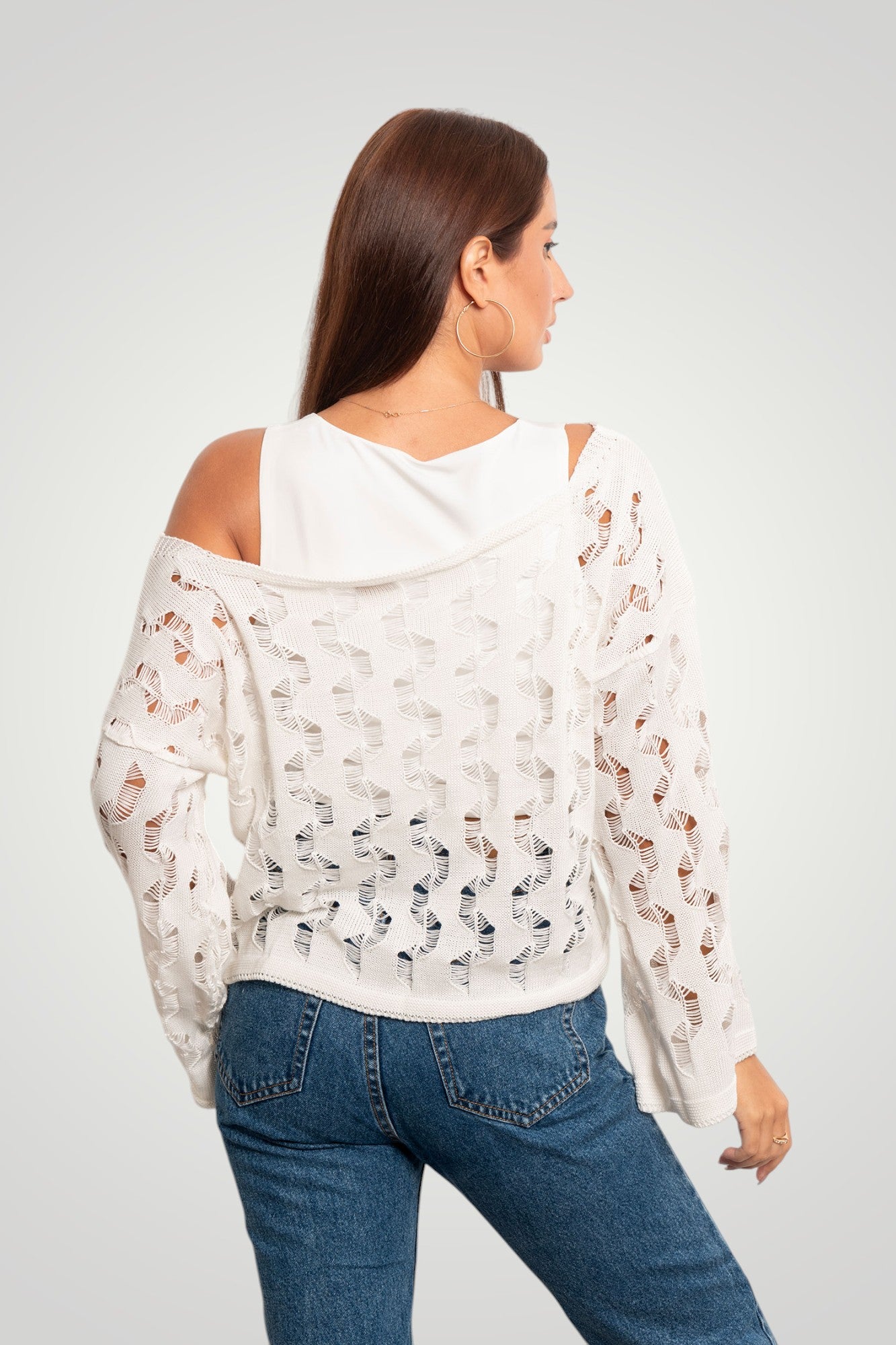 بلوزة محبوكة فضفاضة بأكمام