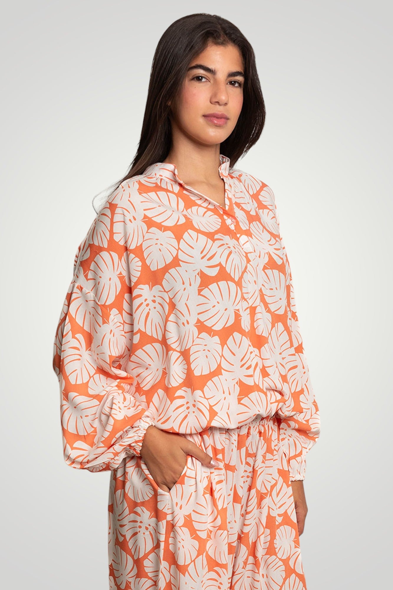 Orange flowered blouse