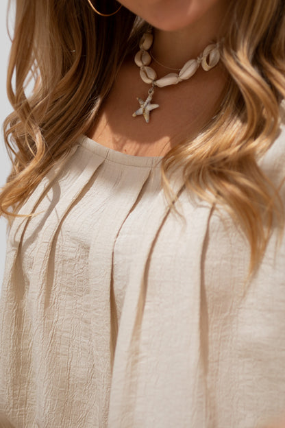Beige sleeveless top