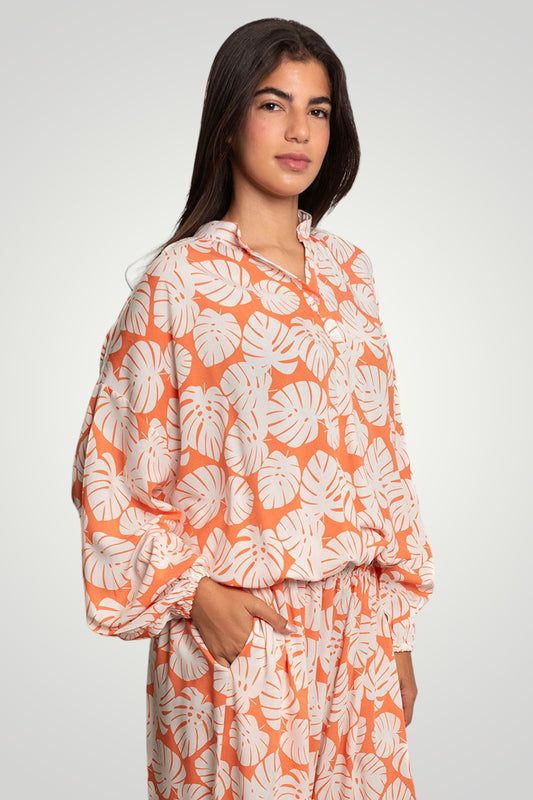 Orange flowered blouse